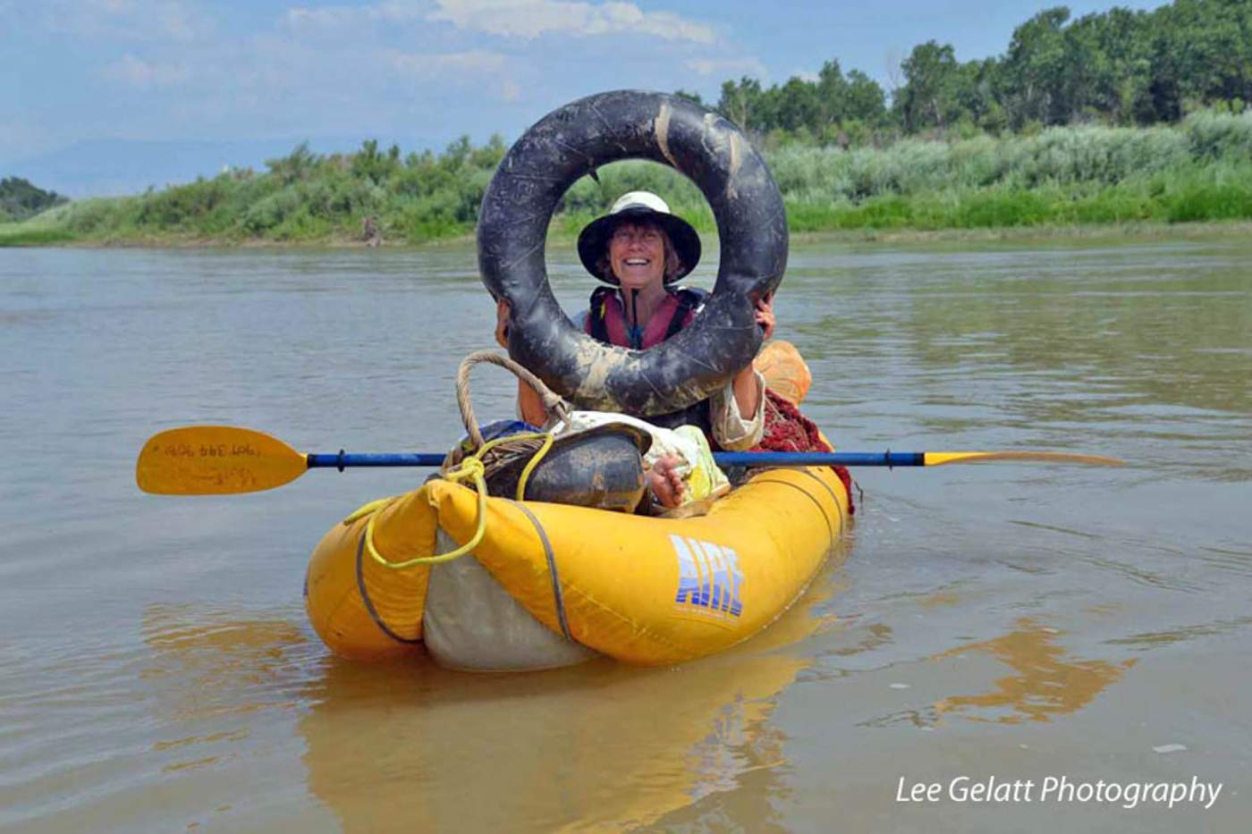 Kayaker with found tire