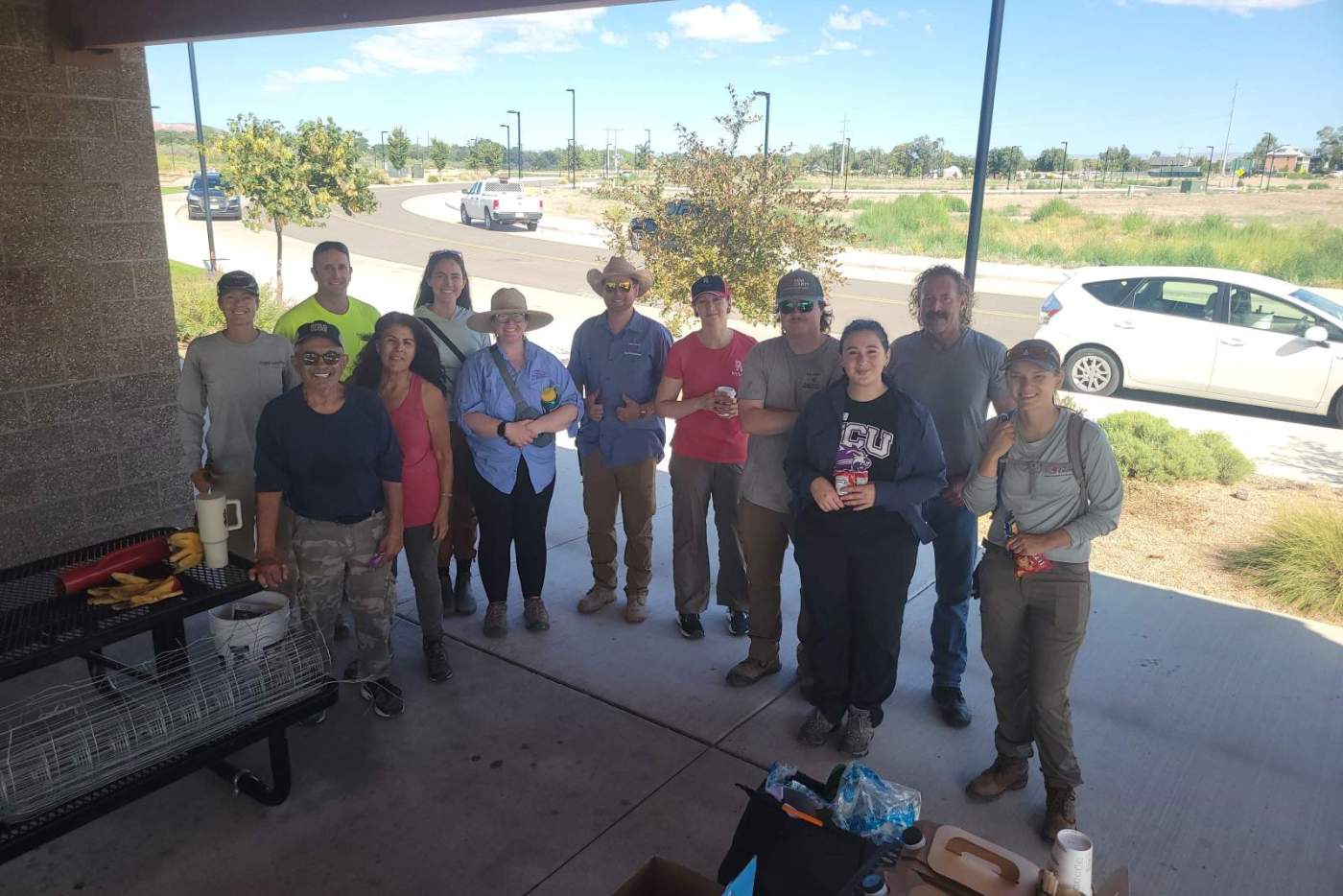 group of volunteers under a pavilion