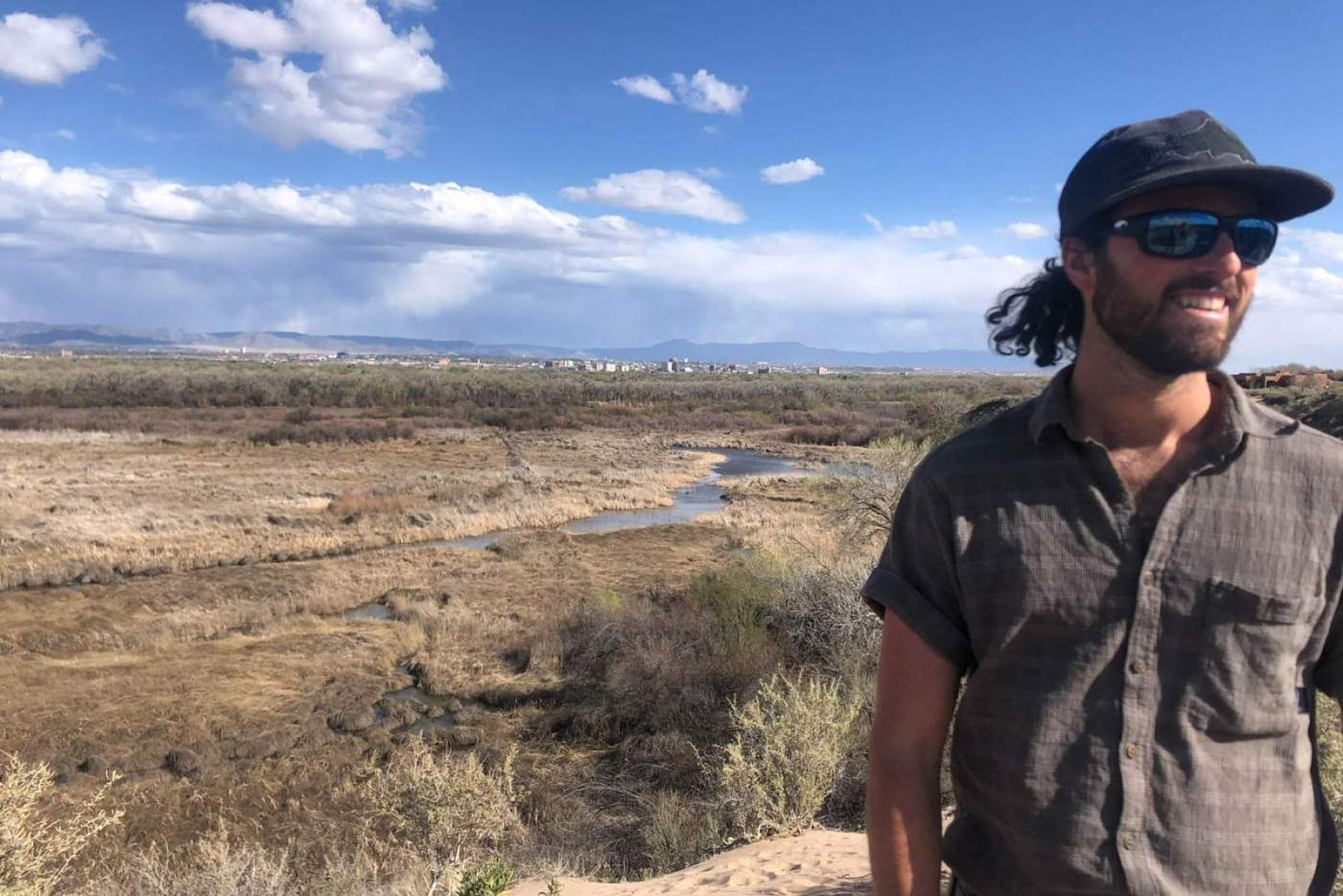 man in front of mountainscape